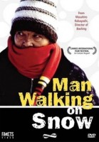 Man Walking On Snow